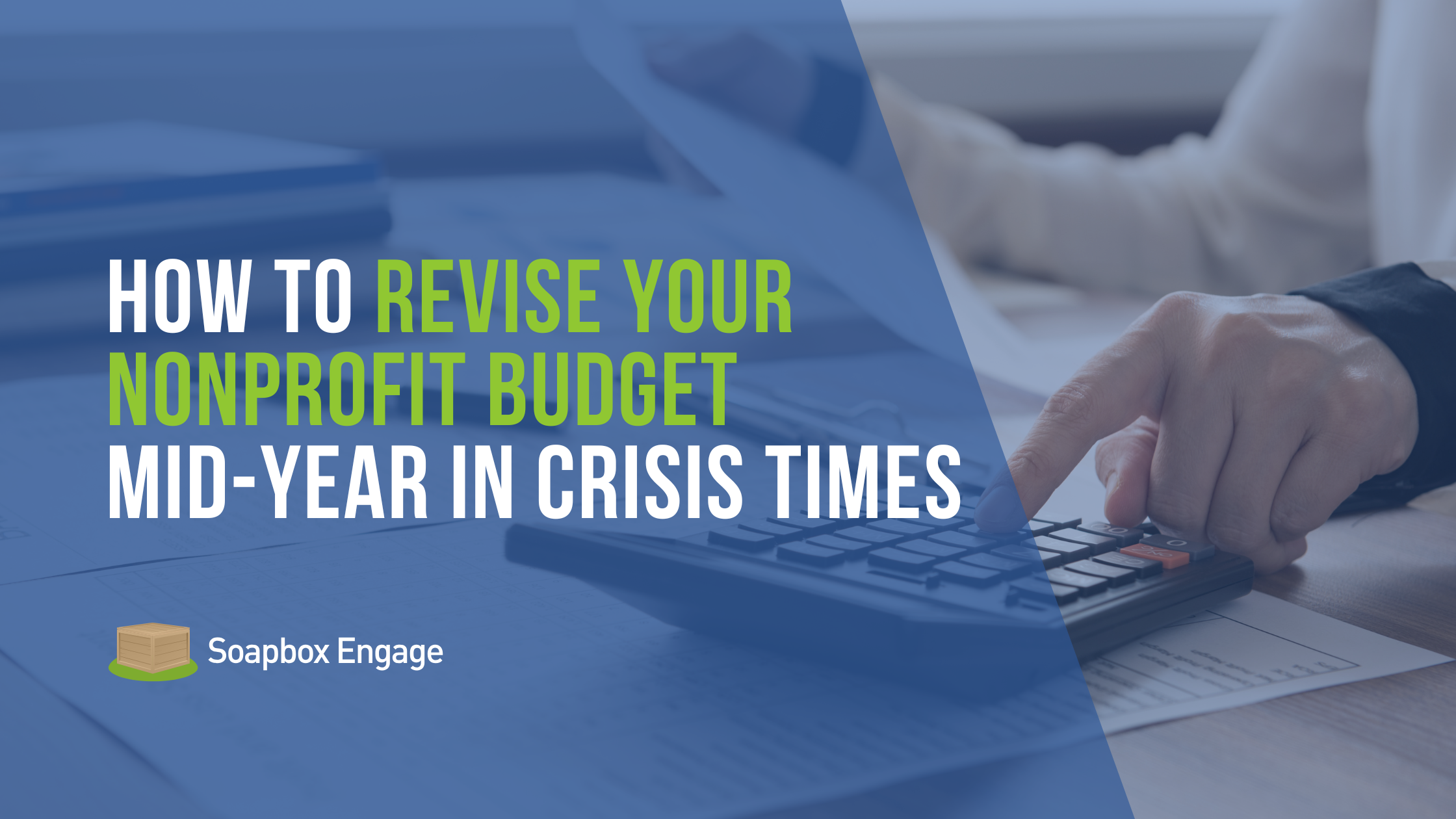 Nonprofit financial leader reviewing a mid-year budget revision at a desk with documents and a laptop